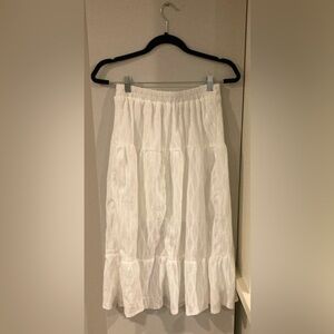 White maxi skirt with simple designs.
